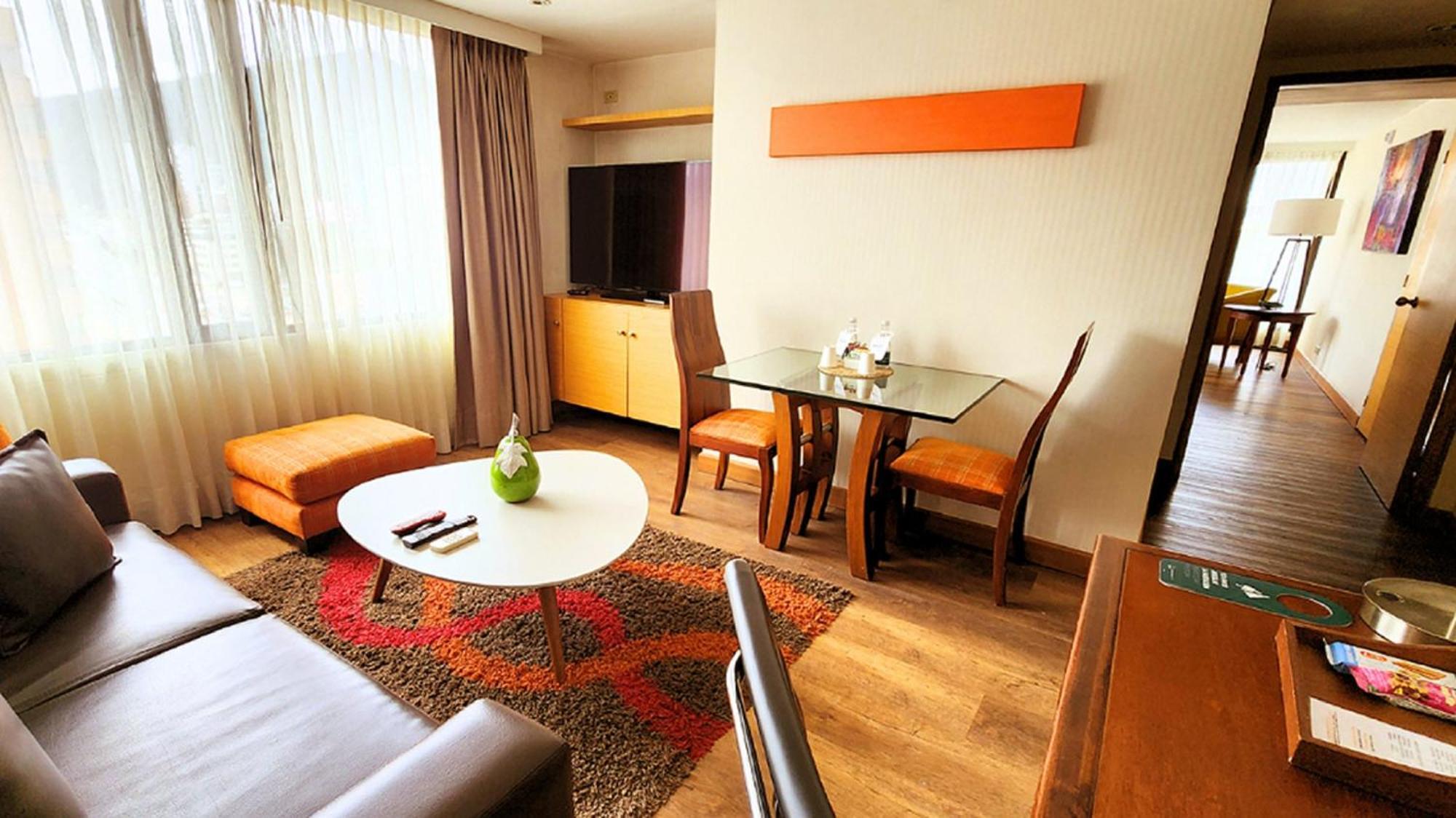 Bogota Plaza Hotel Buitenkant foto A living room in a serviced apartment in Beijing, China